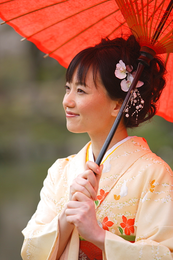 Japanese Woman Holding Parasol