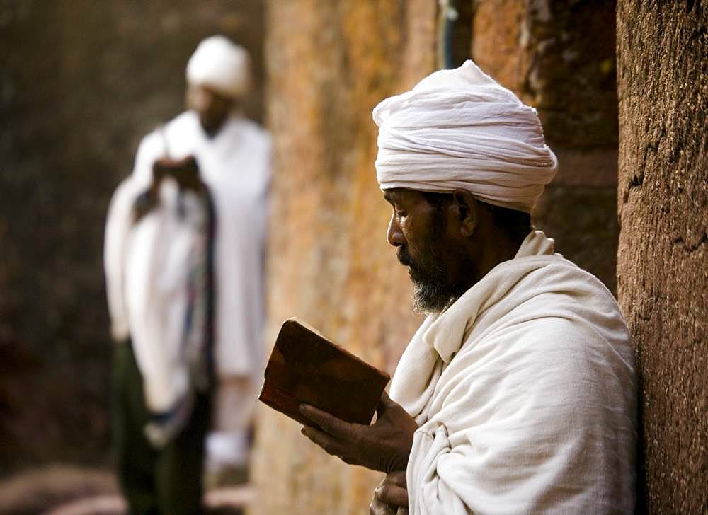 Priest in front of St. Maryam Church