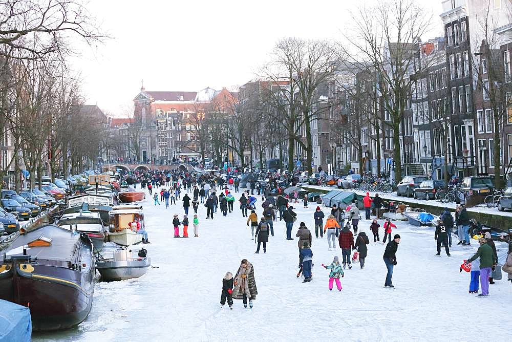 People ice skating in Amsterdam, Netherlands