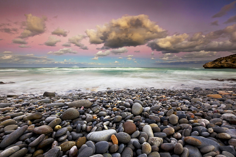 The view out to sea at the southern most point of Africa, Cape Agulhas in South Africa at sunset, Cape Agulhas, Arniston, South Africa