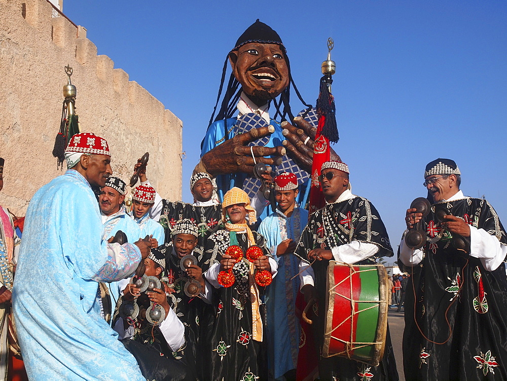 The grand opening parade of the Gnaoua Festival in Essaouira, Morocco, is like a big carnival with figures many metres high