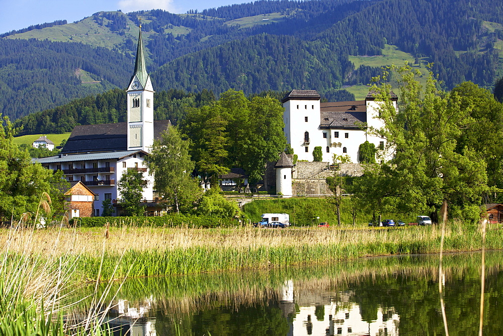 View of Goldegg hotel and Goldegger lake, Austria