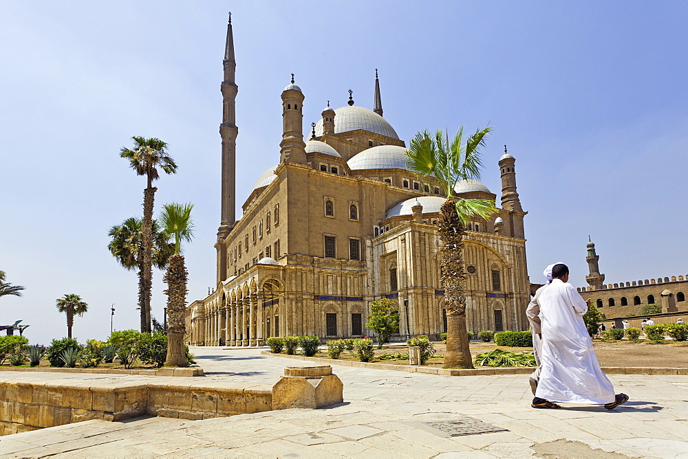 Man walking outside mosque of Muhammad Ali in Citadel, Cairo, Egypt