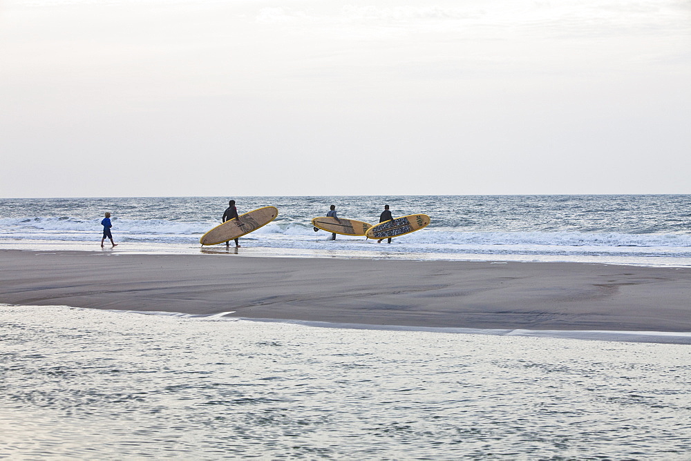 Surfer on beach of Westerland, Sylt, Germany