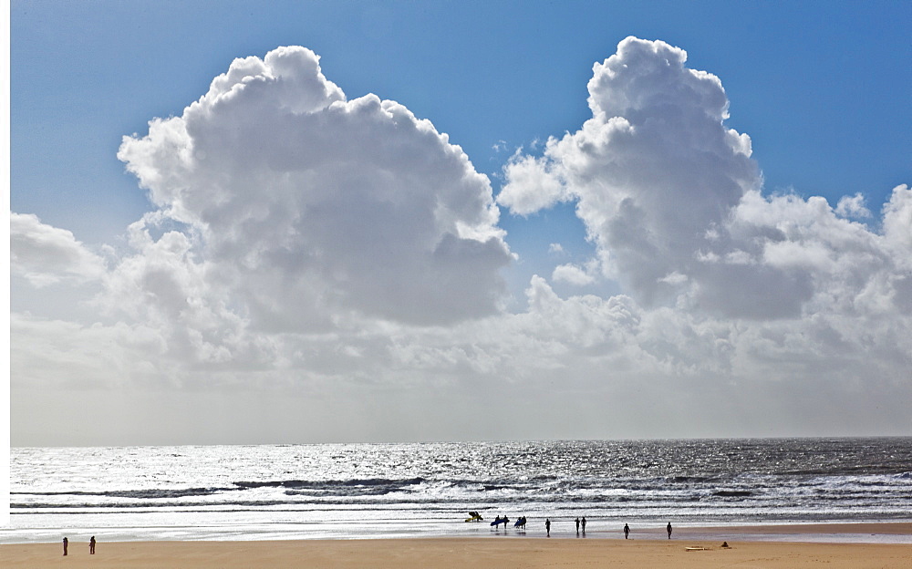 People at beach of Dunraven bay, Wales, UK