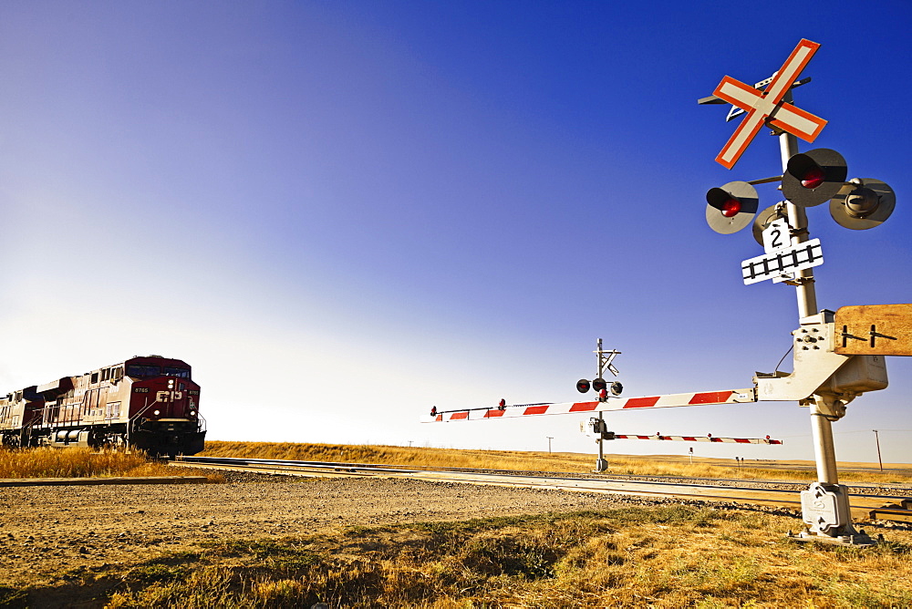 Railway crossing line at Highway 1 west to Alberta, Saskatchewan, Canada 