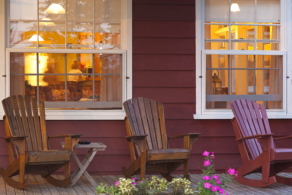 Three wooden chairs in Dalvay by the sea, Prince Edward Island National park, Canada