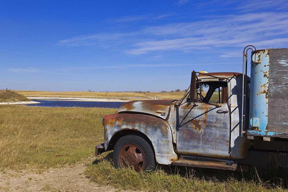 View of old truck on landscape at Highway 20, Saskatchewan, Canada