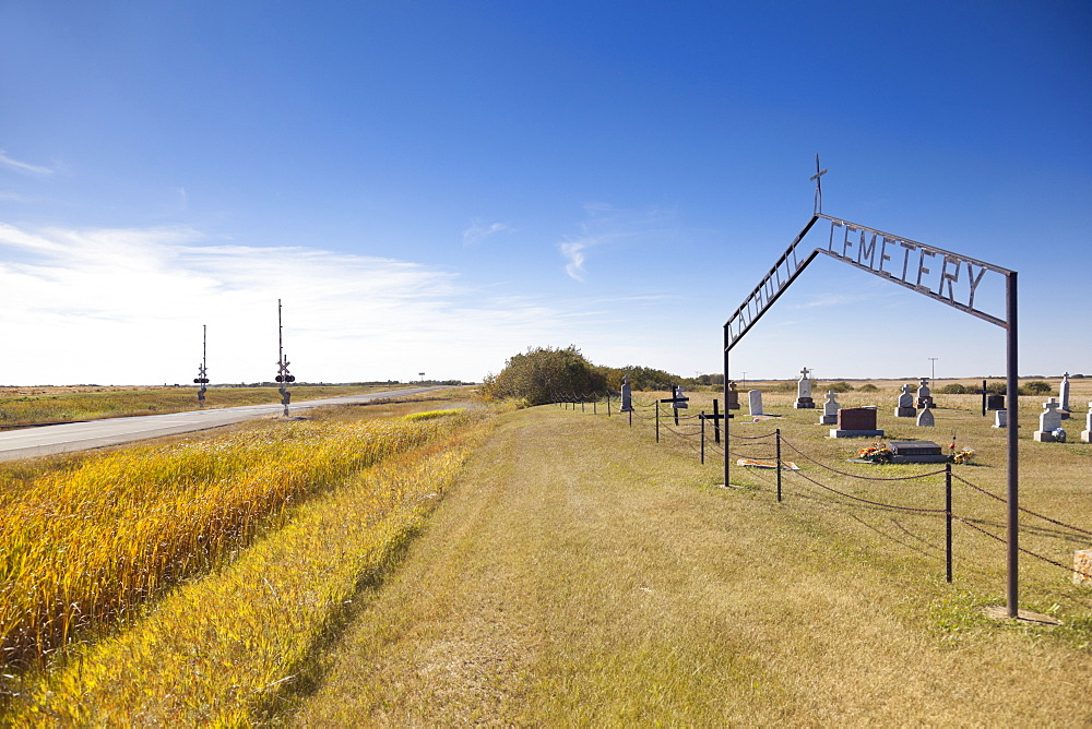 View of Catholic cemetery and landscape on Highway 15, Saskatchewan, Canada