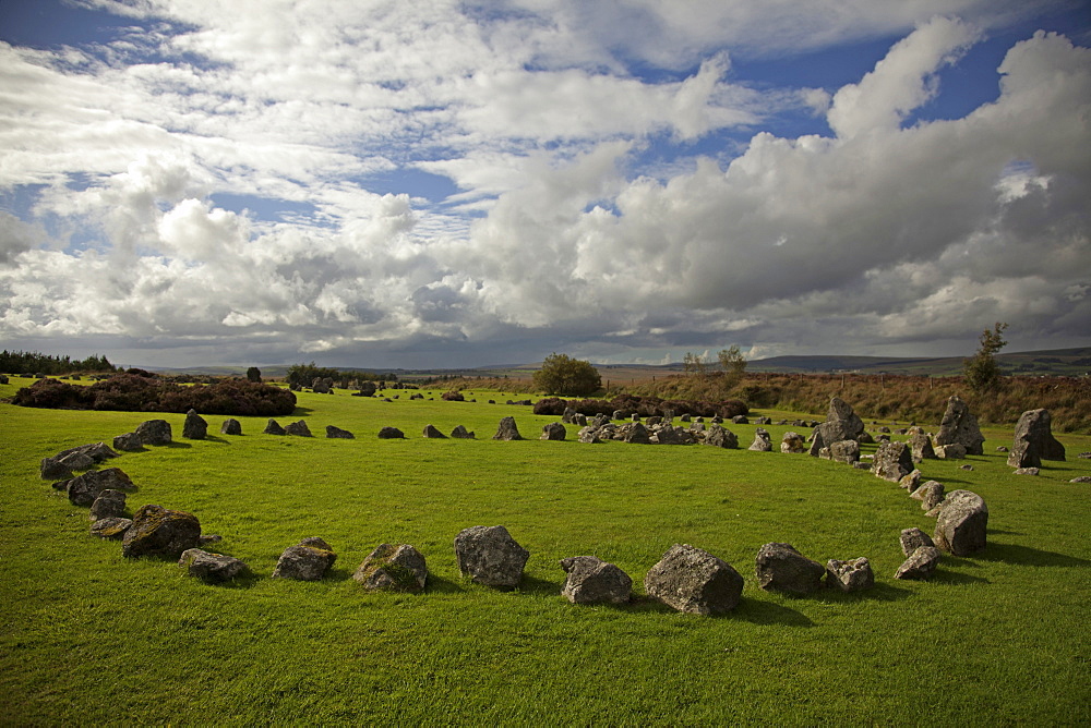 View of Tyrone stone circles on green landscape, Ireland, UK