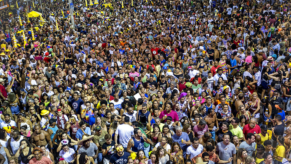 A carnival crowd following a trio electric float, Campo Grande, Salvador, Bahia, Brazil, South America