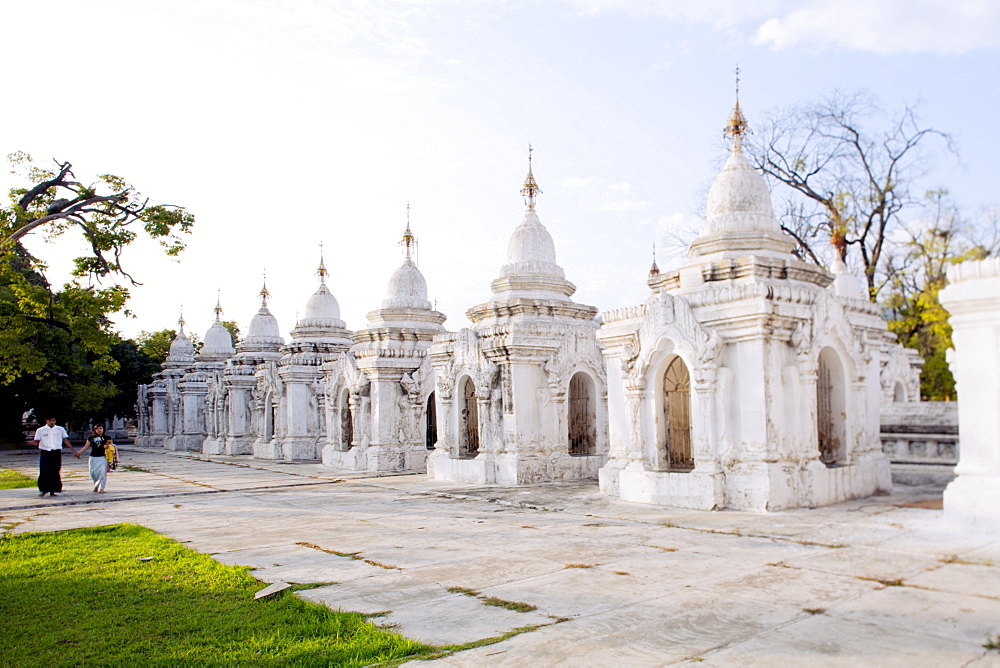 Kuthodaw pagoda - stupas housing the world's largest book, consisting of 729 large marble tablets with the Tipitaka Pali canon, Mandalay, Myanmar (Burma), Southeast Asia