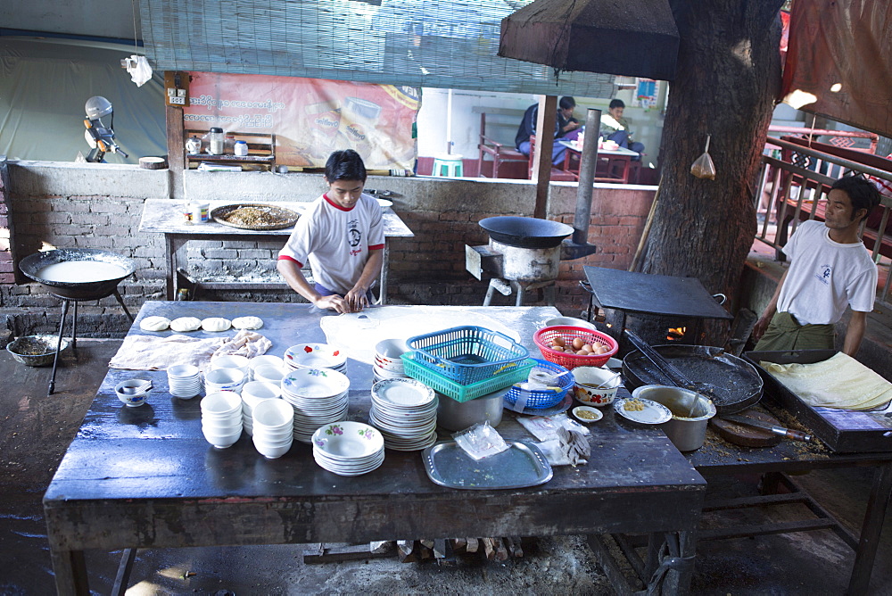 Chef making Burmese bread in a restaurant kitchen, Mandalay, Myanmar, Southeast Asia