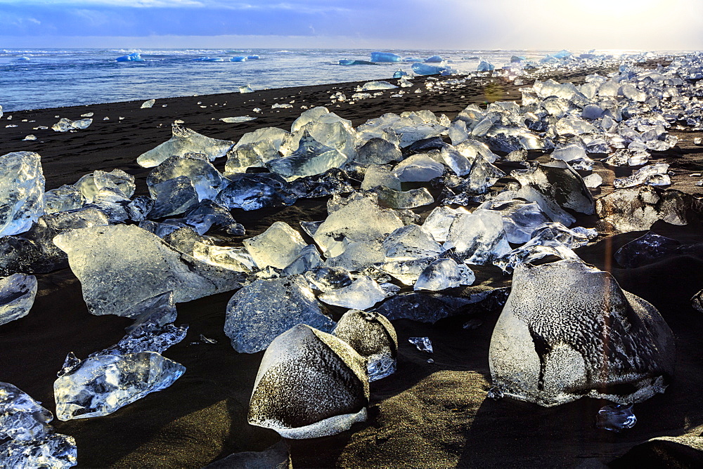 Icebergs on a black sand volcanic beach next to the Jokulsarlon glacial lake in Vatnajokull National Park in southeast Iceland, Polar Regions