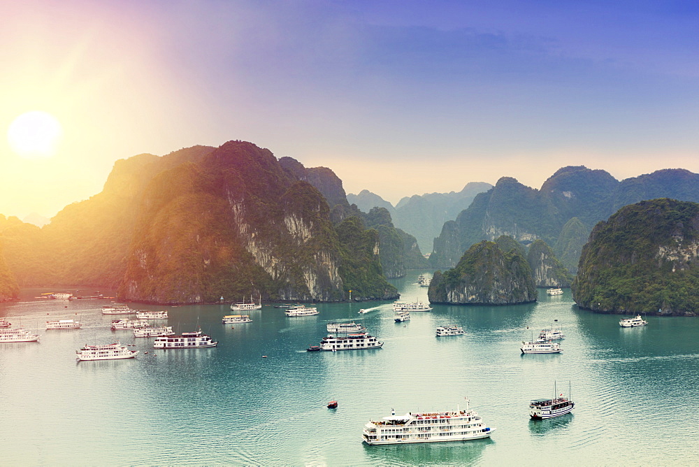 Boats on Halong Bay at sunset, UNESCO World Heritage Site, Vietnam, Indochina, Southeast Asia, Asia