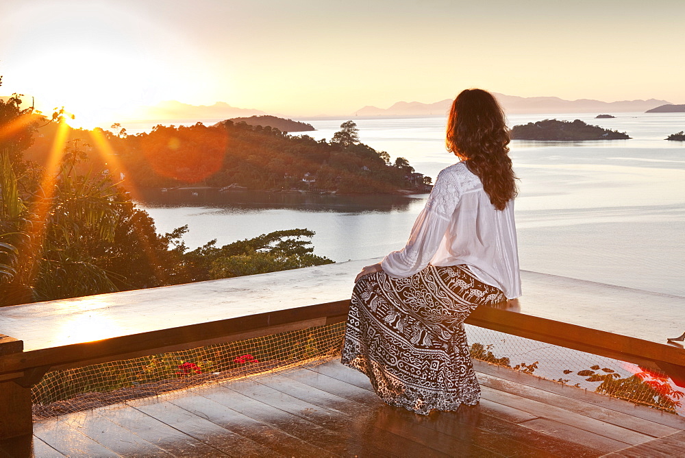 A guest sitting at the Angatu Guest House, Paraty, Rio de Janeiro State, Brazil, South America