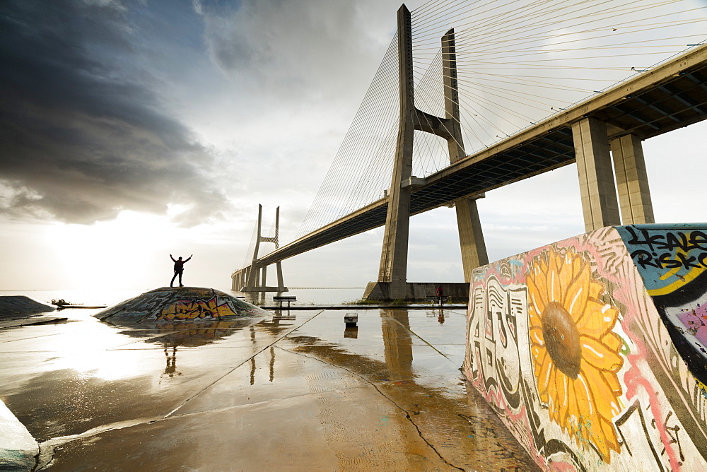 The colorful murals around Vasco Da Gama bridge emphasize its architecture and atmosphere at dawn, Lisbon, Portugal, Europe