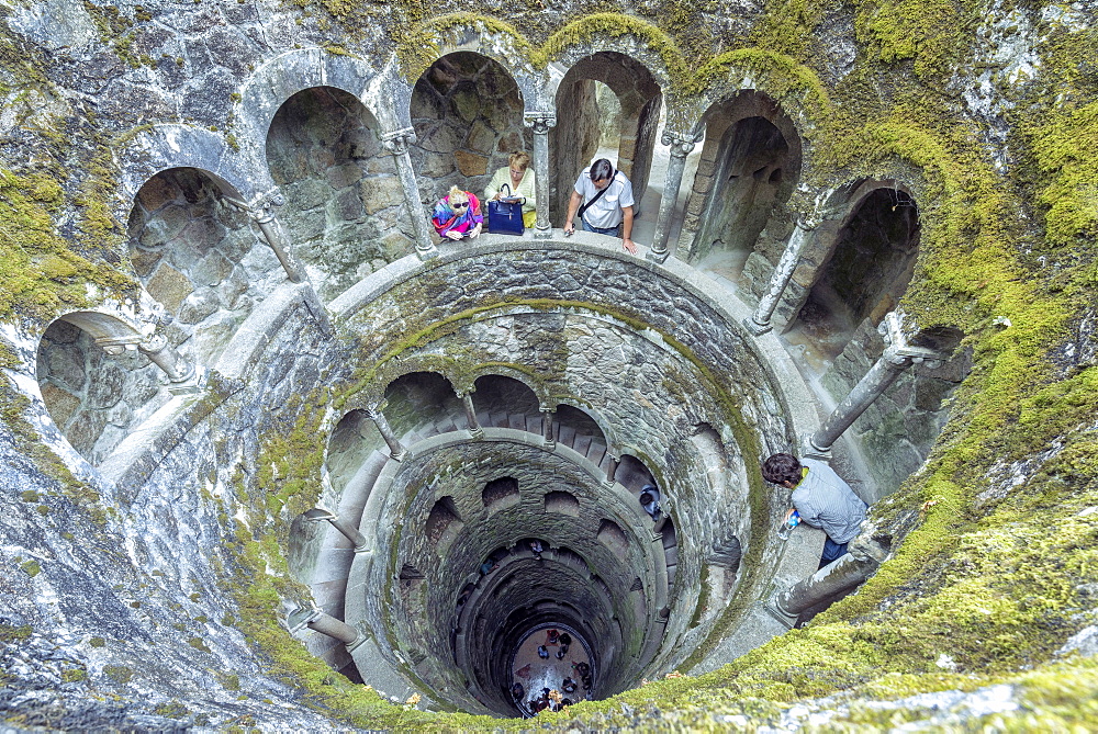 Top view of the spiral stairs inside the towers of masonic Initiation Well at Quinta da Regaleira, Sintra, Portugal, Europe