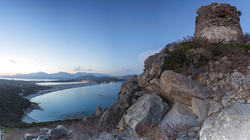 Top view of the bay with sandy beaches and lights of a village at dusk, Porto Giunco, Villasimius, Cagliari, Sardinia, Italy, Mediterranean, Europe