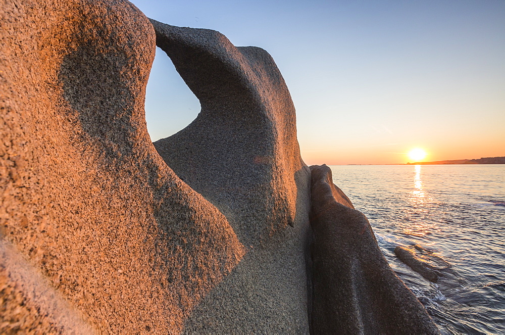 Sunset on the unusual shaped cliffs and blue sea, Capo Testa, Santa Teresa di Gallura, Province of Sassari, Sardinia, Italy, Mediterranean, Europe