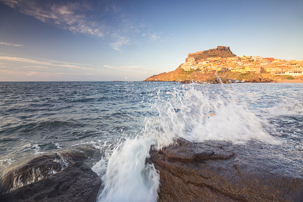 Waves of blue sea frame the village perched on promontory, Castelsardo, Gulf of Asinara, Province of Sassari, Sardinia, Italy, Mediterranean, Europe