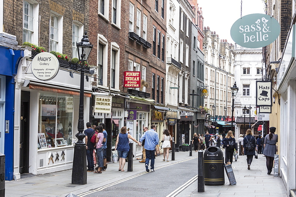 People flock to the shopping streets of Covent Garden, London, England, United Kingdom, Europe