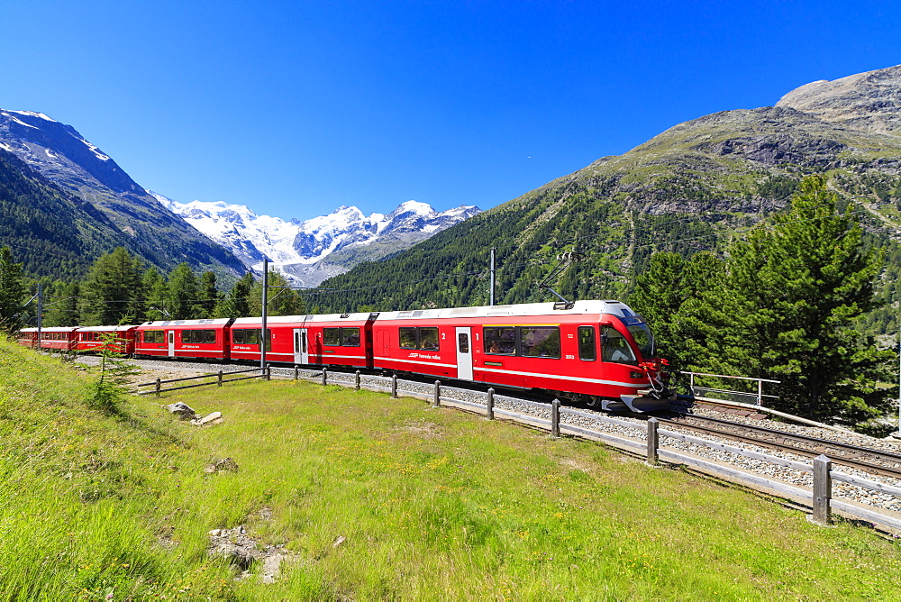 The Bernina Express train at Morteratsch in summer, Engadine, Canton of Graubunden, Switzerland, Europe