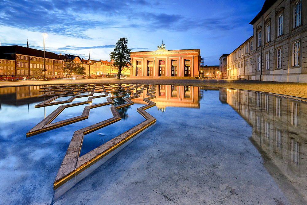 Thorvaldsens Museum reflected in the fountain of Bertel Thorvaldsen's Square at night, Copenhagen, Denmark, Europe