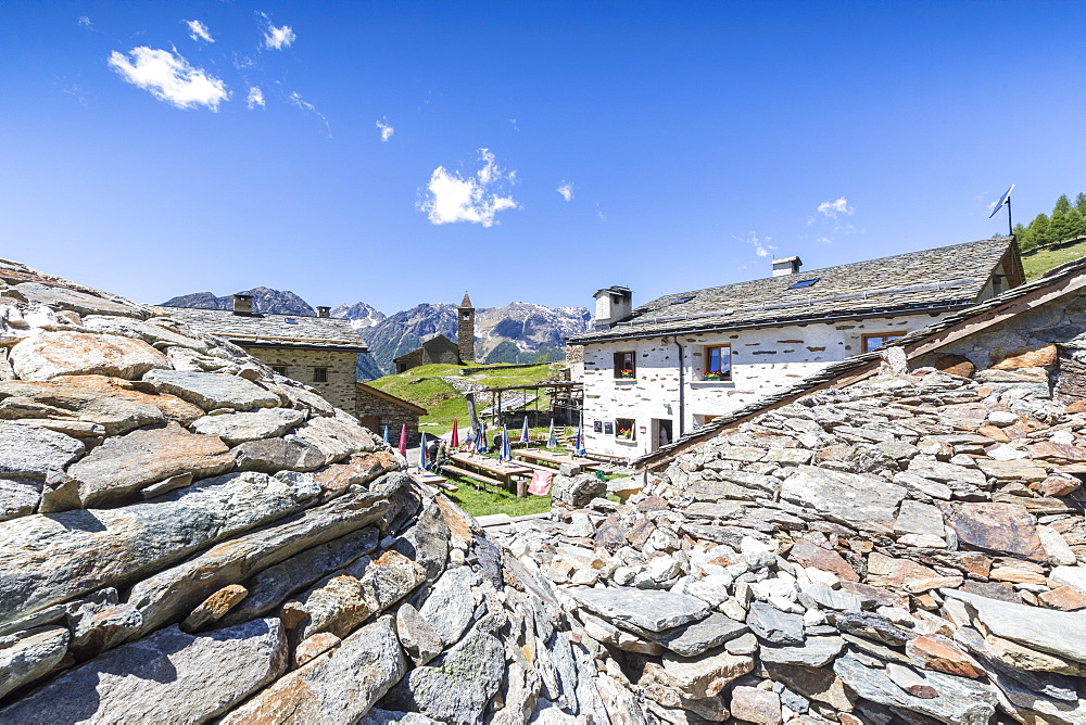 Mountain retreat and old stone caves called Crotto, San Romerio Alp, Brusio, Poschiavo Valley, Canton of Graubunden, Switzerland, Europe