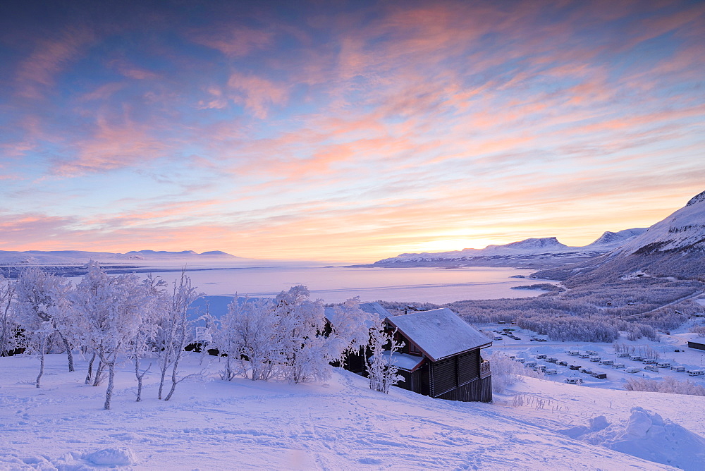 Pink sunrise on the snowy landscape, Bjorkliden, Abisko, Kiruna Municipality, Norrbotten County, Lapland, Sweden, Scandinavia, Europe