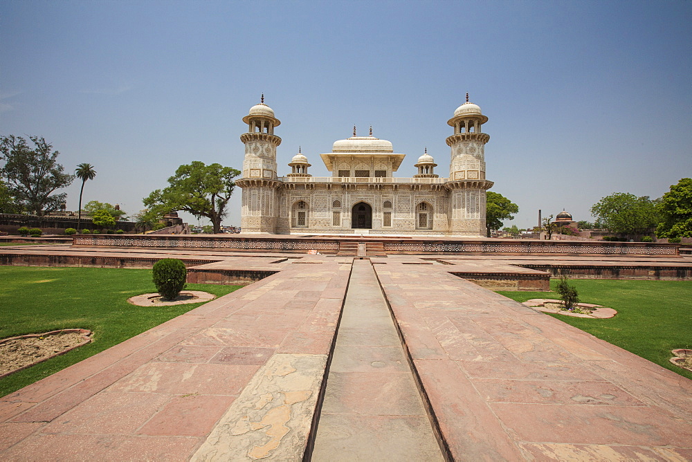 A footpath leads to the sandstone mausoleum of the Moghul Emperor Humayun which has been restored after a period of neglect, Delhi, India, Asia