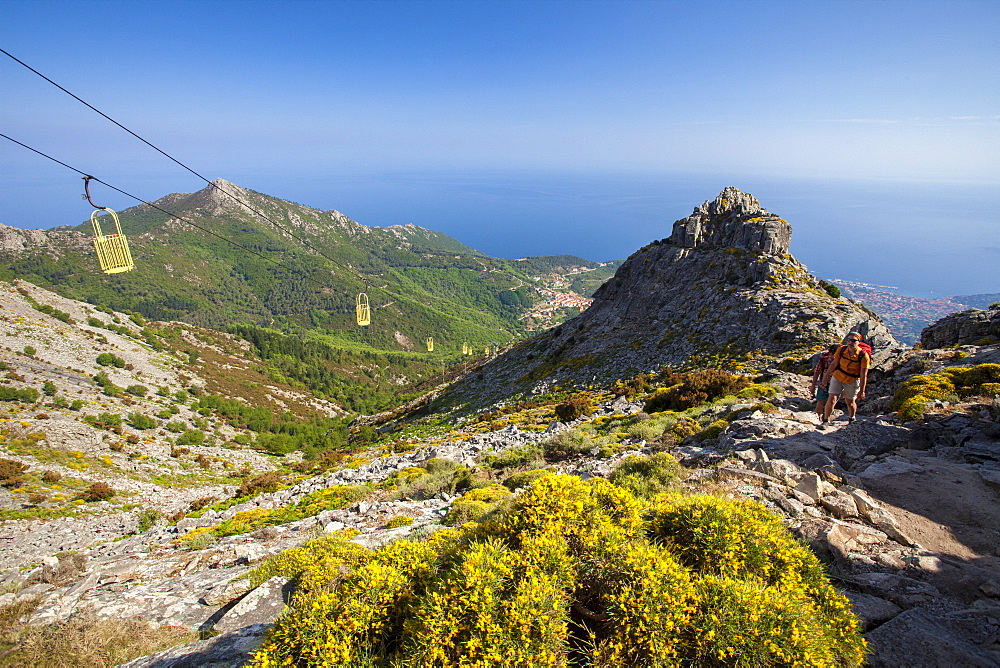 Hikers at cableway, Monte Capanne, Elba Island, Livorno Province, Tuscany, Italy, Europe