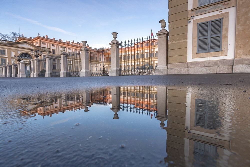 Villa Reale reflected in a puddle, Monza, Lombardy, Italy, Europe