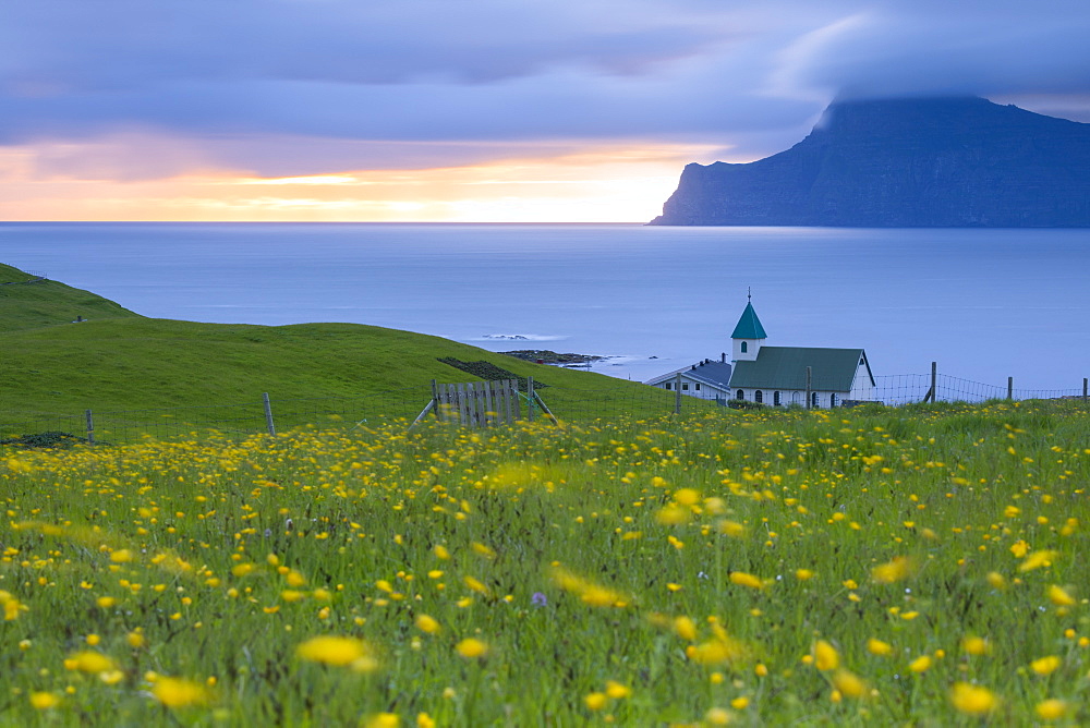 Church on the ocean shore towards Kalsoy Island, Gjogv, Eysturoy Island, Faroe Islands, Denmark, Europe