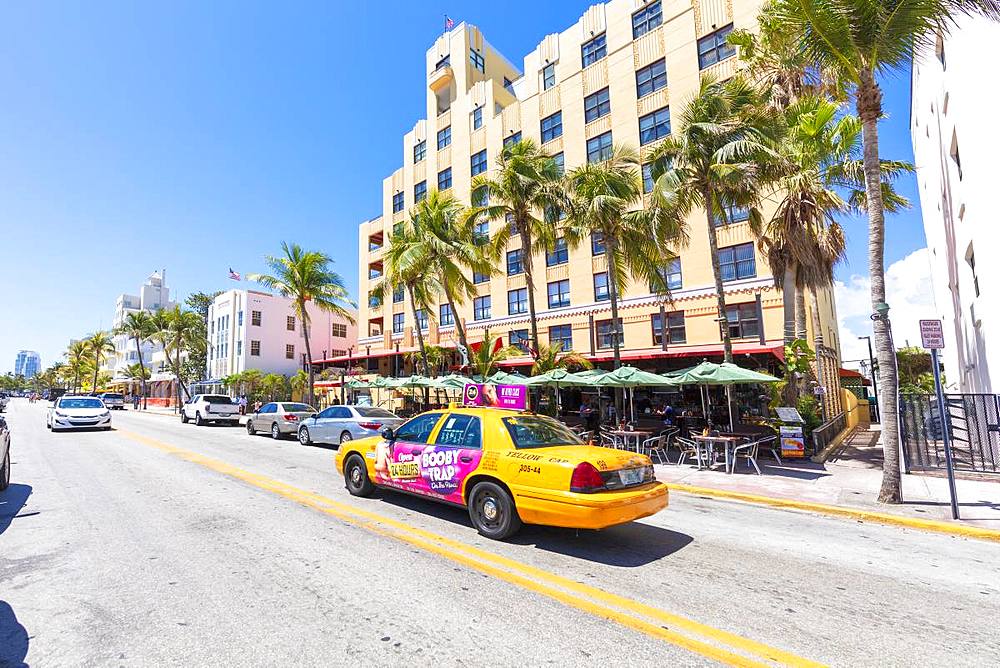 Yellow taxi cab, Ocean Drive, Miami Beach, Florida, United States of America, North America