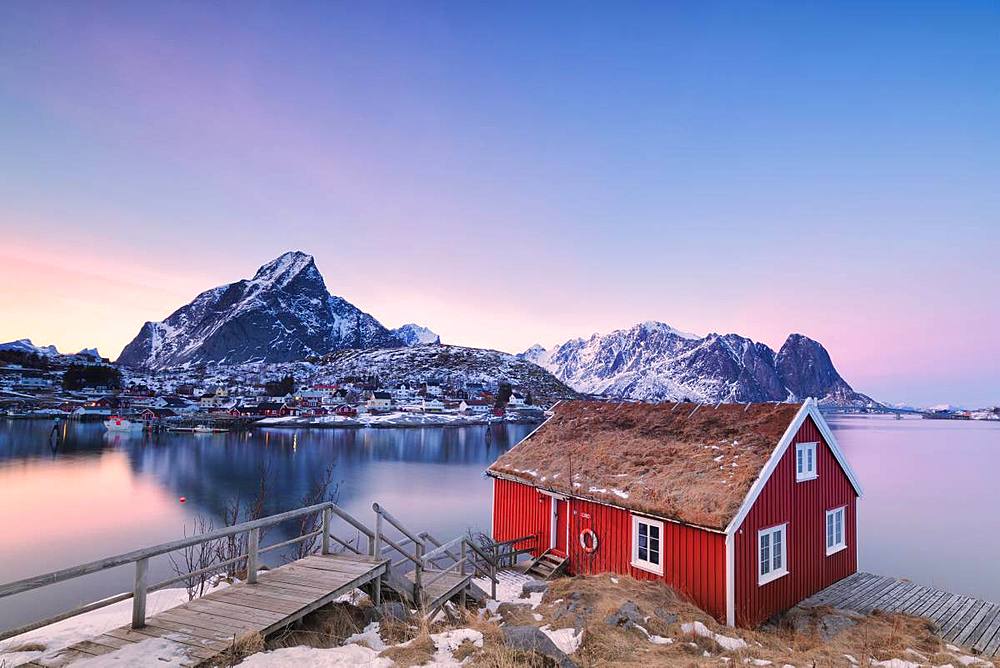 Sunset on fishermen's cabin (Rorbu), Reine, Lofoten Islands, Nordland, Norway, Europe