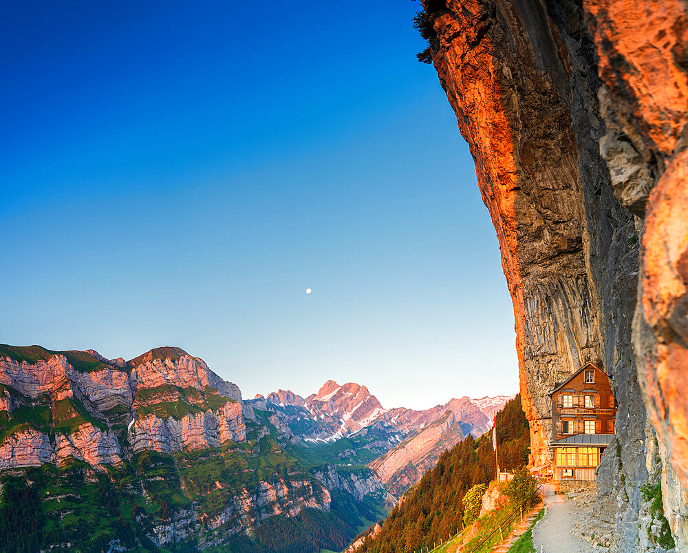 Panoramic of Aescher-Wildkirchli Gasthaus at dusk, Ebenalp, Appenzell Innerrhoden, Switzerland, Europe