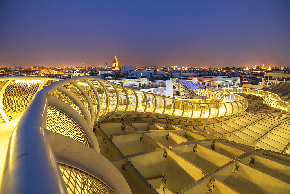 Illuminated spiral curved walkways on rooftop of the Metropol Parasol, Plaza de la Encarnacion, Seville, Andalusia, Spain, Europe