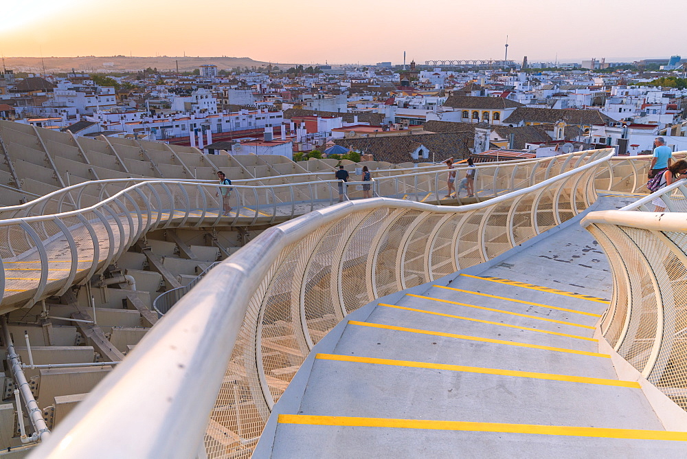 People on curved walkways admire the city skyline, Metropol Parasol, Plaza de la Encarnacion, Seville, Andalusia, Spain, Europe