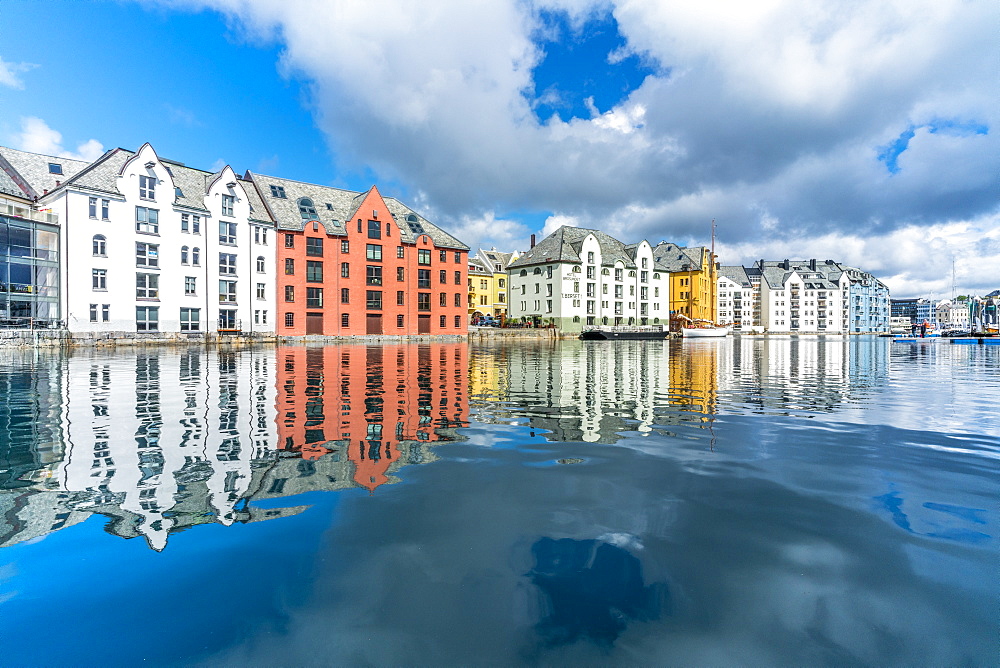 Art Nouveau styled houses mirrored in Brosundet canal, Alesund, More og Romsdal county, Norway, Scandinavia, Europe