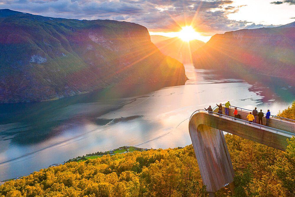 People admiring sunset from Stegastein viewpoint platform above the fjord, aerial view, Aurlandsfjord, Sogn og Fjordane county, Norway, Scandinavia, Europe