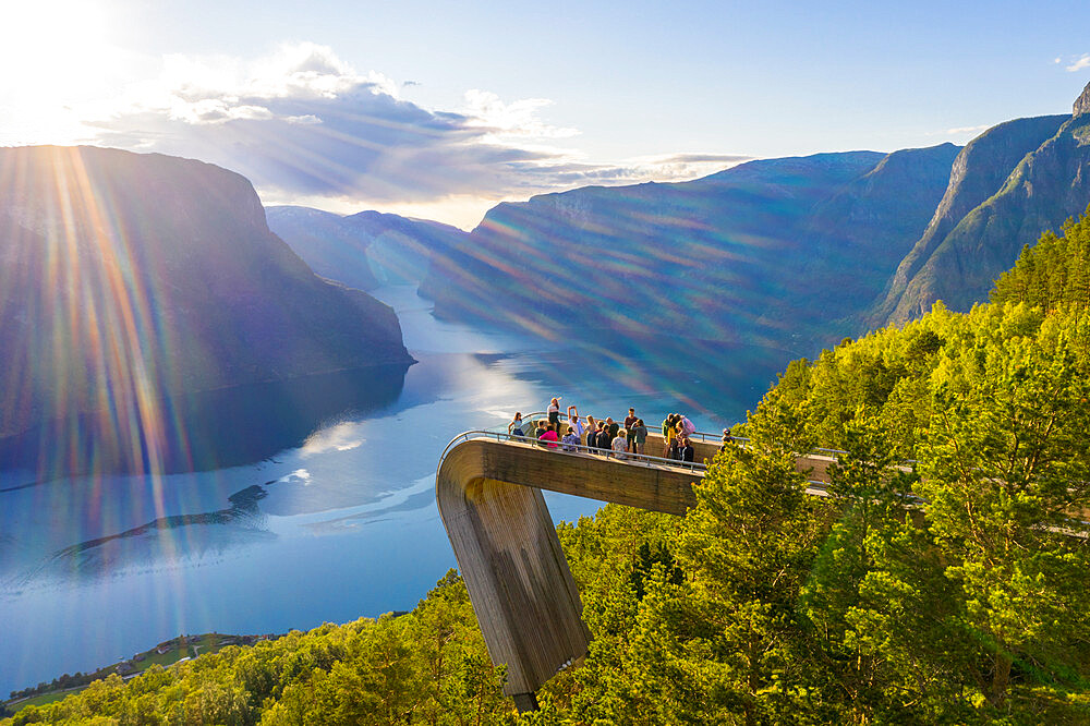 Tourists admiring the fjord from Stegastein viewpoint, Aurlandsvangen, Sognefjord, Norway, Scandinavia, Europe