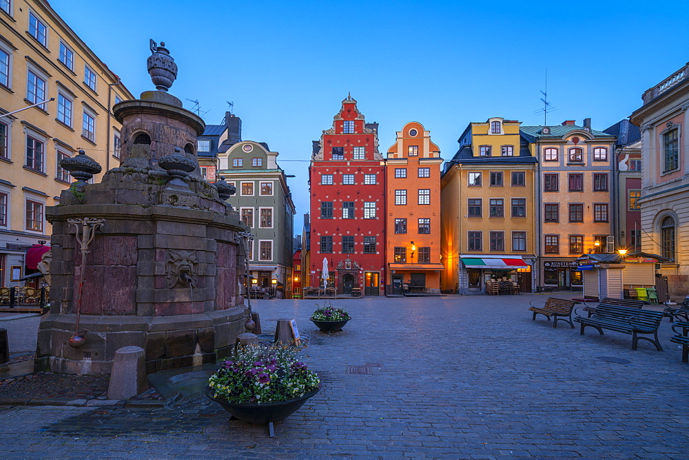 Dusk over the colorful facades of townhouses in the medieval Stortorget Square, Gamla Stan, Stockholm, Sweden, Scandinavia, Europe