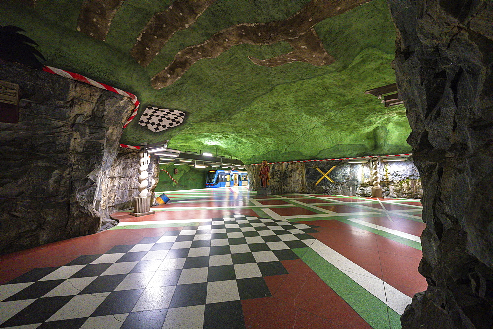 Kungstradgarden Metro station, hewn into the bedrock and painted with vibrant colors to represent the ecosystem, Stockholm, Sweden, Scandinavia, Europe