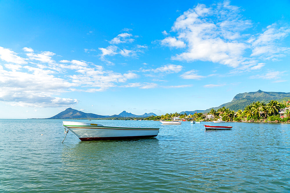 Fishing boats moored in the tropical lagoon, La Gaulette, Black River district, Mauritius, Indian Ocean, Africa