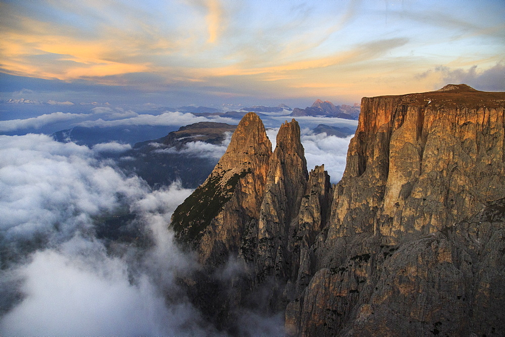 Aerial view of Santner peak at sunset, Sciliar Natural Park, Plateau of Siusi Alp in the Dolomites, Val Funes, Trentino-Alto Adige South Tyrol, Italy, Europe