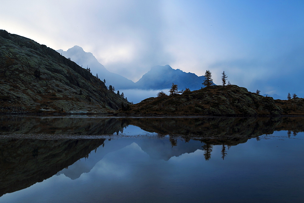 The dusk on Lake Vallette, Natural Park of Mont Avic, Valle d'Aosta, Graian Alps, Italy, Europe