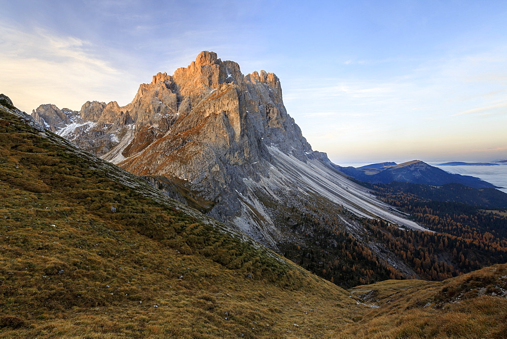 Dawn illuminates the peaks of Forcella De Furcia, Funes Valley, South Tyrol, Dolomites, Italy, Europe