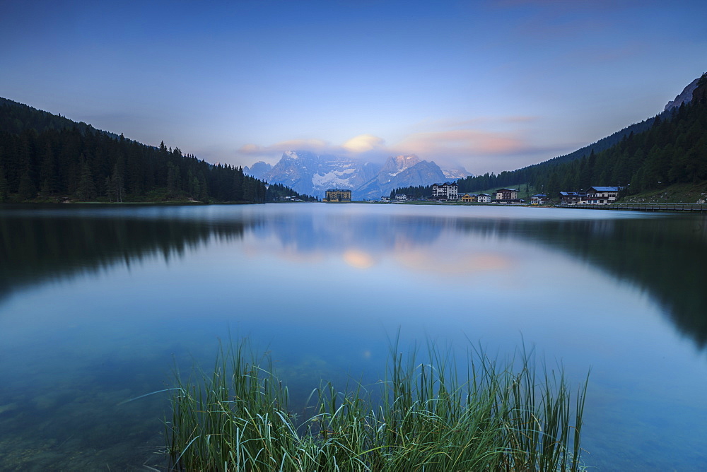 The Sorapiss mountain range is reflected in Lake Antorno at sunrise, Veneto Sesto Dolomites, Italy, Europe