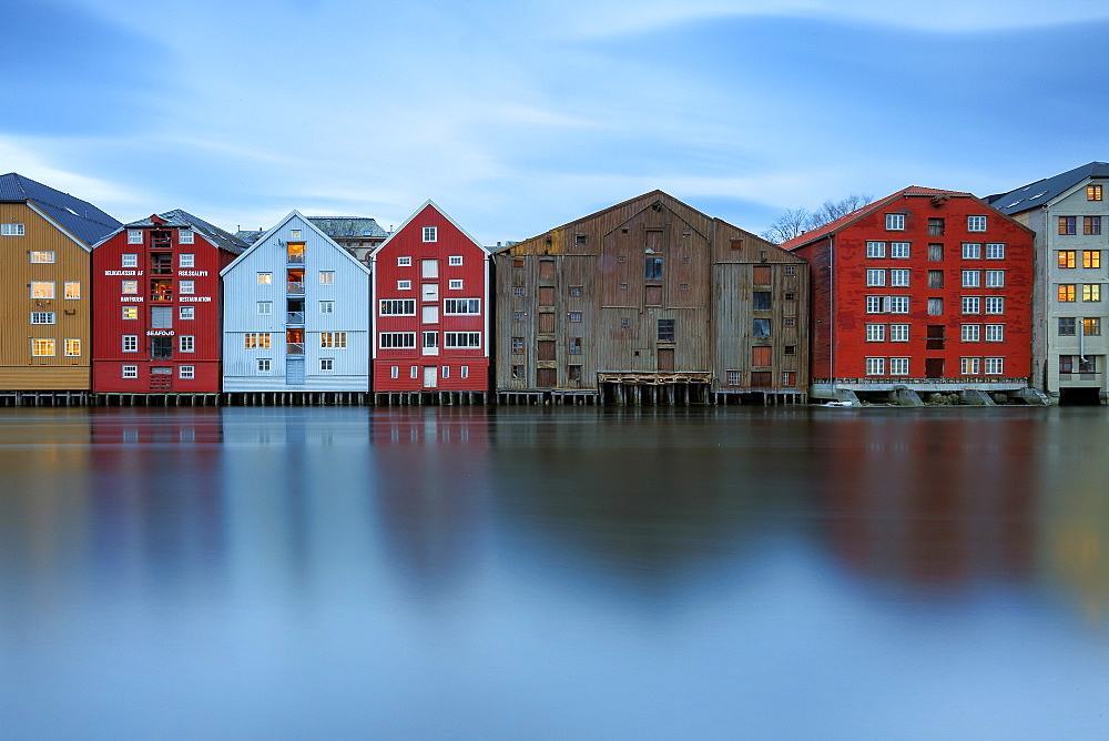 Colorful houses reflected in the River Nidelva, Bakklandet, Trondheim, Norway, Scandinavia, Europe